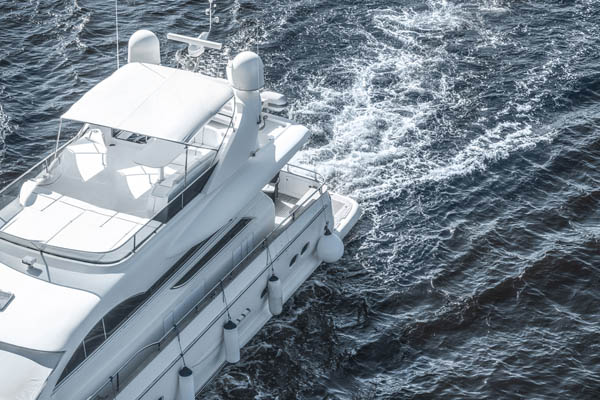 white boat sailing on blue ocean depicting marine fuel supply