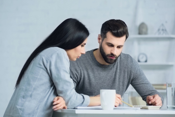 couple assessing home propane use at home