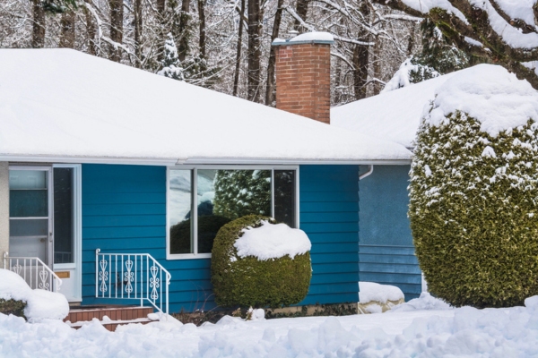 image of a house after a heavy snowfall